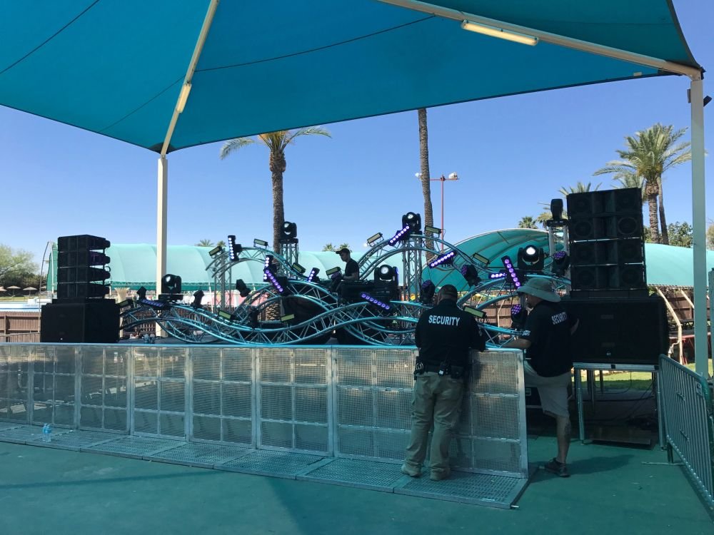 Mobile stage set up outdoors with production lighting