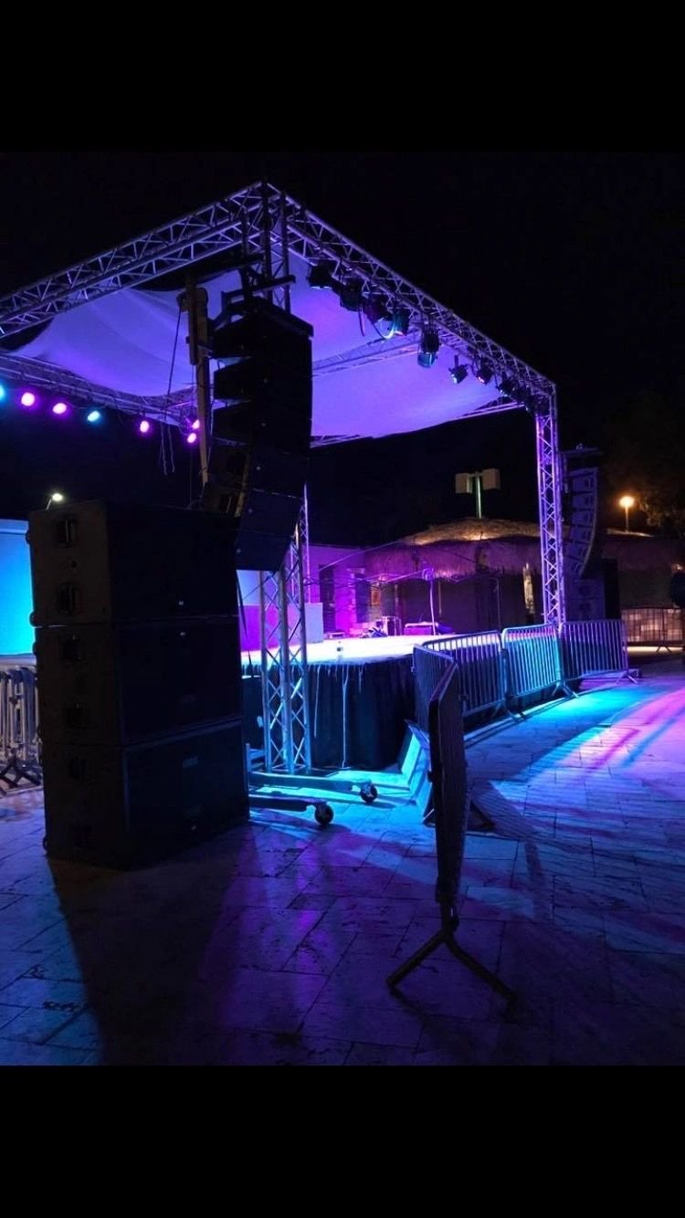 Production lighting and staging for a live audience